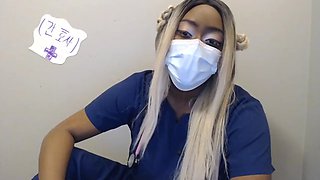 Masked ebony nurse