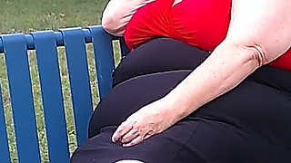Nurse Vicki Smoking in the Park on a Bench All Dressed up