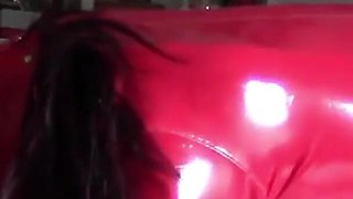 MILF in Red Latex Suit and Patent Leather High Heels Gives a Blowjob with Swallow