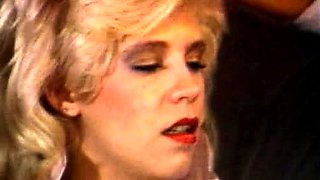 Big titted blonde tramp giving blowjob in hardcore 3some