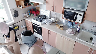 Hot amateur couple having fun in the kitchen.