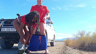 Ebony MILF Taking a Piss Next to the Road and Gets Hubby to Lick Her Pussy Clean After