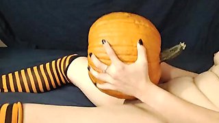 Tran's dame with fangs pulverizes pumpkin in hip highs