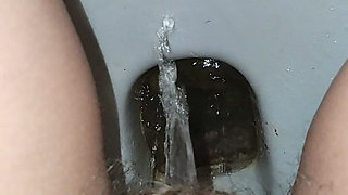 Big Load of Pee From Hairy Pussy