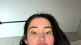 Small titted brunette teen fingering on the bed