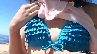 Laimites strips naked at the beach having fun - WeAreHairy