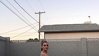 Blonde is flashing her big boobs in the outdoors
