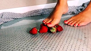Amateur femdom mistress crushing strawberries barefoot