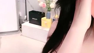 Busty Japanese babe in lingerie has her pussy licked out