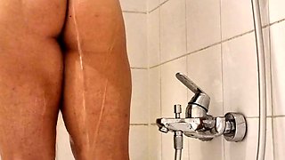 Busty amateur milf masturbates in the shower