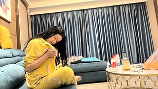 Cute amateur asian web cam girl playing with her toy