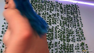 A pretty chick with blue hair enjoys a fat cock in her pussy