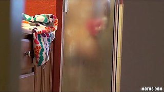 Hot big-booty dark haired is caught in the shower on film