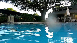 Couple Underwater Diving and Swimming