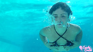 petite teen nude in the swimming pool