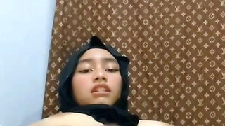 Horny Black Hijab Masturbates Until Her Pussy Is Wet