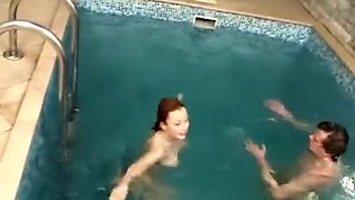 Couple bangs in a pool