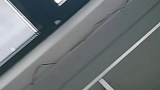 Turkish girl with headscarf who turns on the camera and puts on a show at the construction site