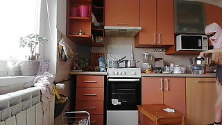 Sexy amateur wife prepares breakfast naked in the kitchen.