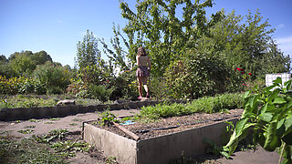 Watching Hot Neighbor Working in Garden