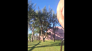 Stepmother in a Bikini in the Garden of the House Makes a Video for Her Stepson, to Show off Her New Clothes.