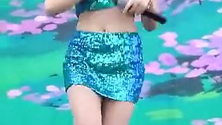 Girl in short skirt dancing