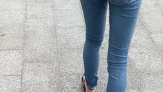 Public Wetting Jeans in Park Near the Beach