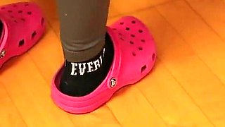 Under Desk Foot Play - Pink Clogs & Worn Socks