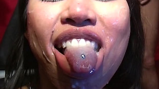 Tattooed Asian doll and German whore fucked in gangbang