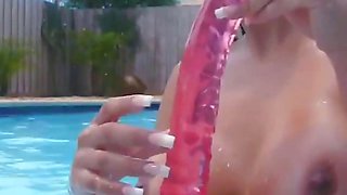 Sexy amateur busty latina is filming herself in the pool