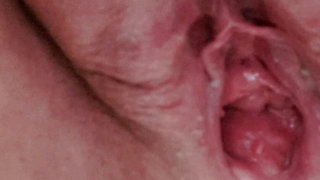 Pissing in close up with open pussy