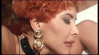 Milly D'Abbraccio and a blonde chick are sharing a hard big black cock for an interratial fuck