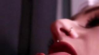Redhead nurse sucks cock at a gloryhole