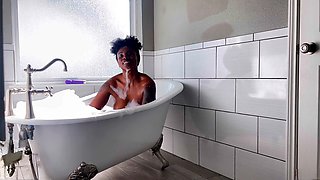 Lyric Sky gets off with a massive dildo in a steamy bubble bath