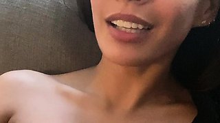 Busty curly brunette with big boobs fucks on couch
