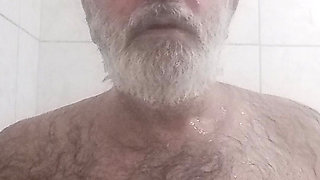 HAIRY BRUTE TAKING A SHOWER