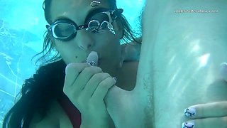 Horny bitch in swim glasses Candy gets fucked from behind in the pool