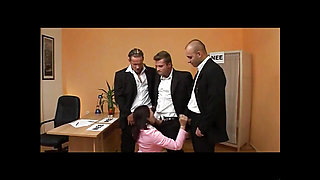 Busty MILF Secretary Sucks Three Huge Cocks in a Bukkake