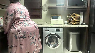 Ebony MILF Moaning and Stripteasing in Kitchen