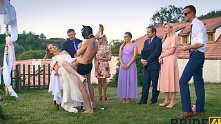 A hot bride is getting fucked outdoors by her husband in a steamy scene