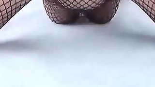 Beach Slut Masturbates in a Fishnet Suit