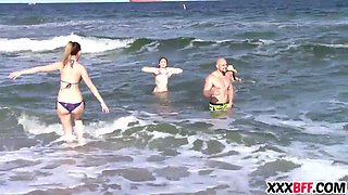 Spring break friends sharing a knob