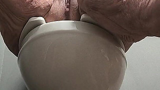 She's Enjoying Rubbing Her Pussy on the Toilet