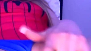 Solo spider-girl rubs her clit and uses her toys