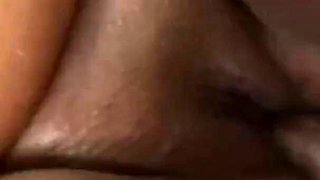 A very fat black woman with a big ass and natural tits fucks a huge black cock