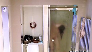 Spying on my gorgeous showering stepsister
