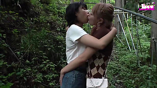 A Blonde and a Dark-haired Beauty Share Wild Passion Beneath the Open Sky -b