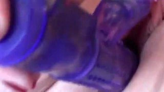 Lily May playing solo on the bed
