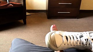 Foot mistress edging masked slave's cock in femdom session