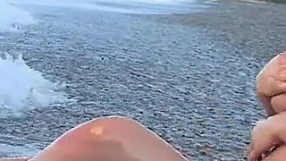 Busty Adrianne Playing on Beach.